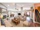 Bright living room featuring a fireplace, hardwood floors, and an open concept layout at 1382 Fountain Lakes Drive Dr, Lawrenceville, GA 30043