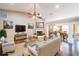 Bright and airy living room showcasing hardwood floors, comfortable seating, and a fireplace, blending style and comfort at 1382 Fountain Lakes Drive Dr, Lawrenceville, GA 30043