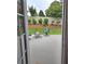 Inviting backyard patio with an outdoor seating area and a charming fire pit at 1382 Fountain Lakes Drive Dr, Lawrenceville, GA 30043