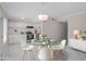 Bright, modern kitchen with marble floors, stainless appliances, white cabinets, and a view to the dining area at 3210 Quincetree Lane Ln, Decatur, GA 30034