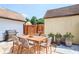 Charming patio features an outdoor dining set and BBQ grill, perfect for entertaining at 3210 Quincetree Lane Ln, Decatur, GA 30034