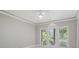Airy bedroom with tray ceiling and lots of natural light at 10630 N Edgewater Pl, Johns Creek, GA 30097