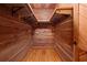 Walk-in closet with custom wood shelving at 10630 N Edgewater Pl, Johns Creek, GA 30097