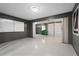 Well-lit garage featuring epoxy flooring and ample space, perfect for parking and projects at 10630 N Edgewater Pl, Johns Creek, GA 30097