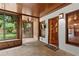 Outdoor patio with stone floors, natural light, and garden views at 10630 N Edgewater Pl, Johns Creek, GA 30097