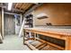 Unfinished basement workbench area with concrete floors and walls at 2786 Overlook Ne Dr, Atlanta, GA 30345