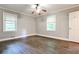 Bedroom featuring hardwood floors, neutral paint and two windows at 2786 Overlook Ne Dr, Atlanta, GA 30345