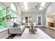 Bright living room with a large window, hardwood floors, and comfortable seating at 2786 Overlook Ne Dr, Atlanta, GA 30345