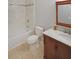 Bathroom features a marble countertop, tile floor, and tiled shower-tub combo at 4191 Alaina Cir, Austell, GA 30106
