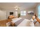 Spacious main bedroom offers a ceiling fan, great natural light, and ample closet space at 4191 Alaina Cir, Austell, GA 30106