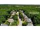 Aerial view of the neighborhood with trees and several homes at 5059 Belair Bluff Se Ct, Smyrna, GA 30126