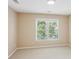 Bedroom with neutral carpet, and a window at 5059 Belair Bluff Se Ct, Smyrna, GA 30126