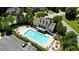 Community pool with ample seating and parking at 5059 Belair Bluff Se Ct, Smyrna, GA 30126