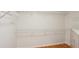 Walk-in Closet features custom shelving for ample storage at 5059 Belair Bluff Se Ct, Smyrna, GA 30126
