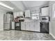 Functional kitchen featuring stainless steel appliances and ample counter space at 543 S Holly Springs Rd, Woodstock, GA 30188