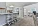 The kitchen overlooks the dining and living area at 543 S Holly Springs Rd, Woodstock, GA 30188