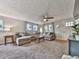 Spacious living room featuring a neutral color palette and plenty of natural light at 543 S Holly Springs Rd, Woodstock, GA 30188