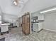 Inviting living area with neutral colors and a view into an open kitchen area at 543 S Holly Springs Rd, Woodstock, GA 30188