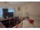 This bedroom has a window providing natural light and is equipped with an air conditioning unit at 6385 Highway 92, Fairburn, GA 30213