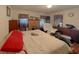 Comfortable bedroom with a bed, a brick fireplace, and natural light, offering a cozy and inviting space at 6385 Highway 92, Fairburn, GA 30213