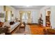 Bright and airy living room with hardwood floors, large windows, and neutral decor at 954 Bryant Sw St, Conyers, GA 30012