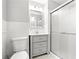 Updated bathroom featuring modern vanity, tiled floor, and enclosed shower at 1359 Scott Blvd, Decatur, GA 30030