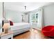 Bright bedroom featuring hardwood floors, ample closet space, and neutral decor at 1359 Scott Blvd, Decatur, GA 30030