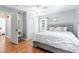 Inviting bedroom with hardwood floors, large closet, and soft, neutral color palette at 1359 Scott Blvd, Decatur, GA 30030
