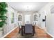 Bright dining room featuring a wooden table, hardwood floors and stylish accents at 1359 Scott Blvd, Decatur, GA 30030