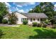 Charming exterior view of a white-brick home with well-manicured landscaping at 1359 Scott Blvd, Decatur, GA 30030