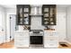 Modern kitchen with stainless steel appliances, white cabinetry, and sleek countertops at 1359 Scott Blvd, Decatur, GA 30030