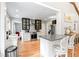 Bright, updated kitchen with stainless steel appliances and breakfast bar open to the living room at 1359 Scott Blvd, Decatur, GA 30030
