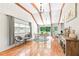 Spacious living room with vaulted ceiling, hardwood floors, and abundant natural light at 1359 Scott Blvd, Decatur, GA 30030
