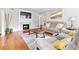 Cozy living room with fireplace, hardwood floors, and comfortable seating at 1359 Scott Blvd, Decatur, GA 30030