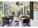 Relaxing screened porch with comfortable seating and a serene outdoor view at 1359 Scott Blvd, Decatur, GA 30030