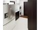 Functional laundry room with modern appliances and plenty of storage at 1658 Altadena Sw Pl, Atlanta, GA 30311