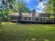 View of the wooden deck and gazebo area, offering a relaxing outdoor space at 185 Colemans Bluff Dr, Woodstock, GA 30188