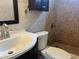 Cozy bathroom with updated tile shower, toilet and sink area with new vanity and fixtures at 185 Colemans Bluff Dr, Woodstock, GA 30188