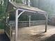 A covered outdoor gazebo deck offers a tranquil setting for relaxation at 185 Colemans Bluff Dr, Woodstock, GA 30188