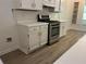Updated kitchen featuring new appliances, fresh paint, updated countertop and refinished cabinets at 185 Colemans Bluff Dr, Woodstock, GA 30188
