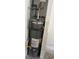 Rheem-branded water heater with assorted plumbing and connections; appears to be in a closet or unfinished part of the house at 185 Colemans Bluff Dr, Woodstock, GA 30188