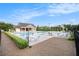 Spacious community pool with ample seating and umbrellas for a relaxing outdoor experience at 1865 Henley Way, Alpharetta, GA 30009