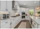 Well-equipped kitchen with stainless appliances, stylish cabinetry, and quartz countertops at 1865 Henley Way, Alpharetta, GA 30009