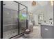 Gorgeous bathroom with a glass shower, large soaking tub, and double vanity sinks at 1865 Henley Way, Alpharetta, GA 30009
