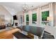 The dining area features a farmhouse table and backyard views at 5355 Wyntree Ct, Peachtree Corners, GA 30071
