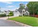 Well-maintained home with a neatly landscaped front yard, a two-car garage, and inviting curb appeal at 5355 Wyntree Ct, Peachtree Corners, GA 30071