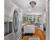 Bright kitchen featuring modern stainless steel appliances and granite countertops at 5355 Wyntree Ct, Peachtree Corners, GA 30071