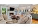 A spacious open-concept living space shows sightlines to the kitchen and dining areas at 5355 Wyntree Ct, Peachtree Corners, GA 30071