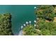 Aerial view of a cove with multiple docks surrounded by lush trees at 7875 Robin Rd, Cumming, GA 30041