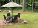 Backyard patio area with a table and chairs, perfect for outdoor dining and entertaining with a great view at 170 Beatrice St, Dallas, GA 30157
